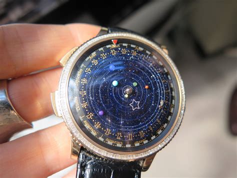 van cleef arpels planetarium watch